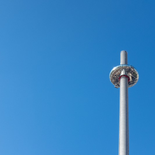 Brighton i360 observation tower against a clear blue sky