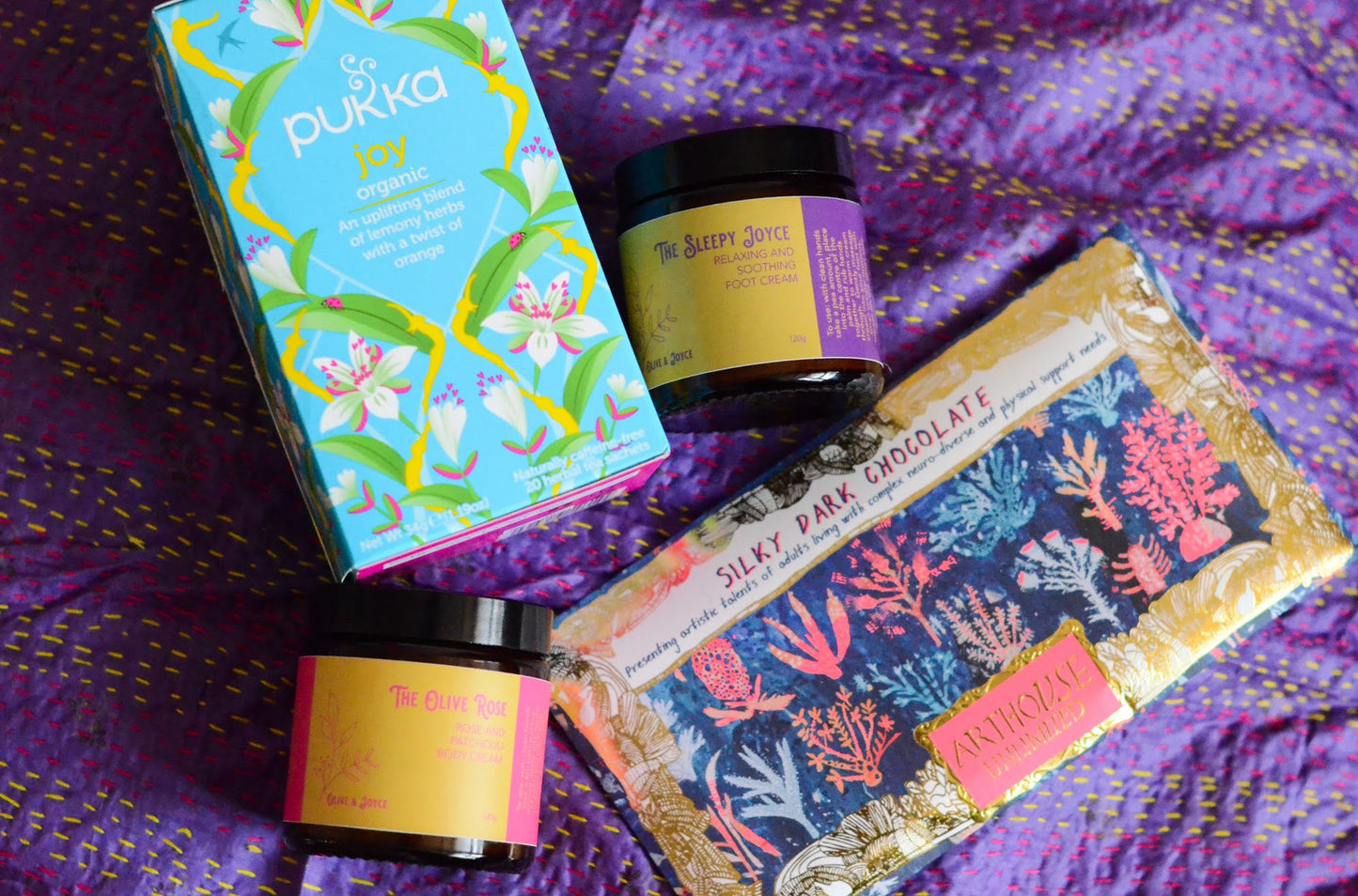 Natural skincare body cream, foot cream, pukka tea and Arthouse unlimited chocolate by the natural skincare company