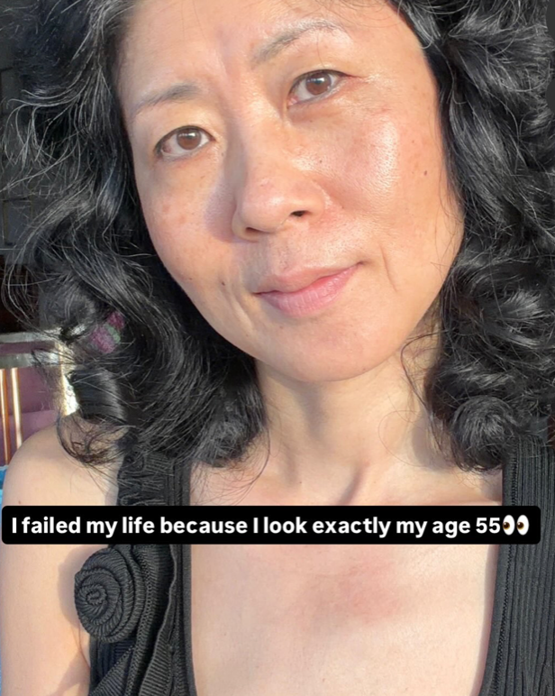 Natural portrait of a 55-year-old woman embracing pro ageing skin, showing real texture, glow and confidence without filters.