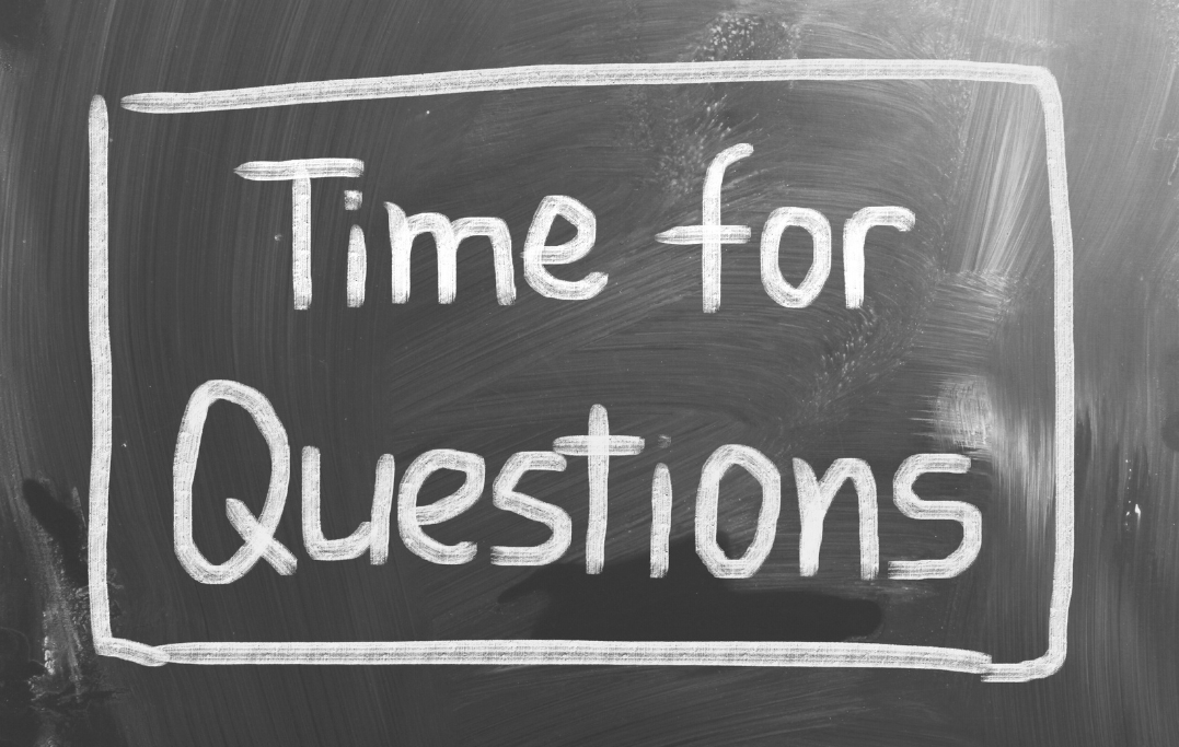 dusty chalk board with time for questions written on it, with a square boarder