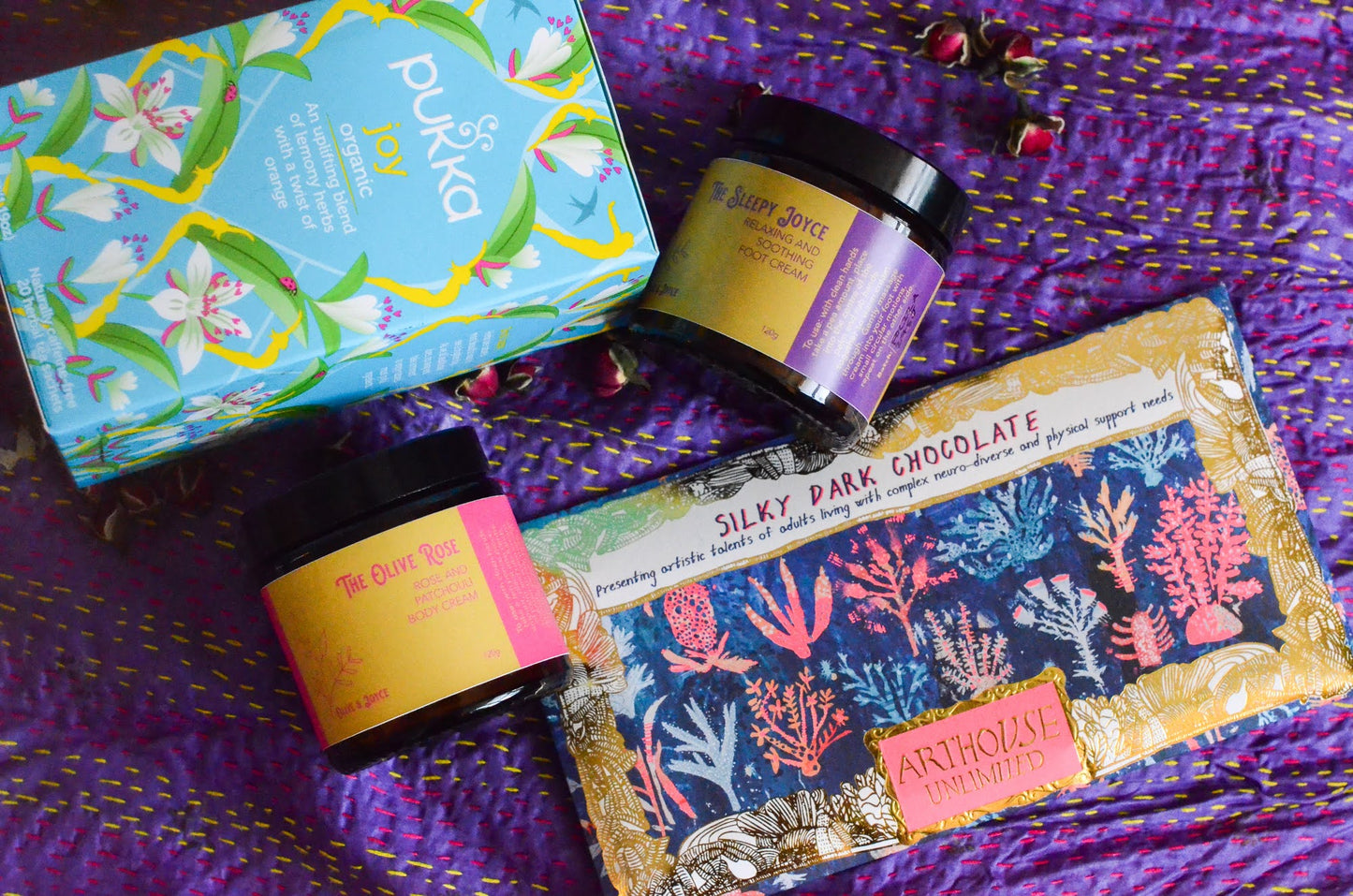 Natural skincare body moisturiser, foot cream, pukka tea and Arthouse unlimited chocolate by the natural skincare company
